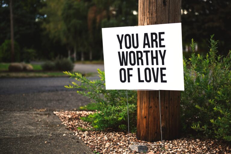 A Sign Board stating “You Are Worthy of Love”